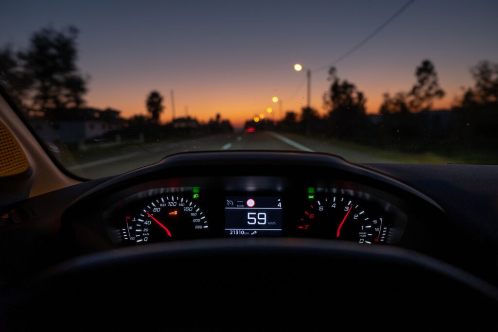 Image showing advanced car technology, like driver assistance systems, aimed at reducing speeding.